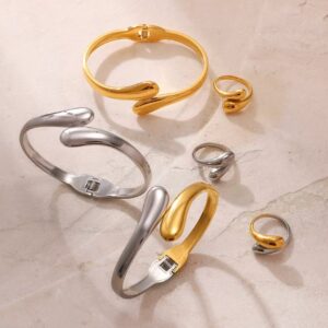 Gold plated 304 stainless steel spring open bangle with smooth teardrop ends, wholesale jewelry