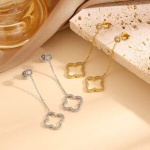 Rhinestone hollow four‑leaf clover earring close‑up